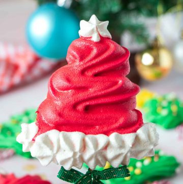 Christmas meringue pop shaped like a santa hat