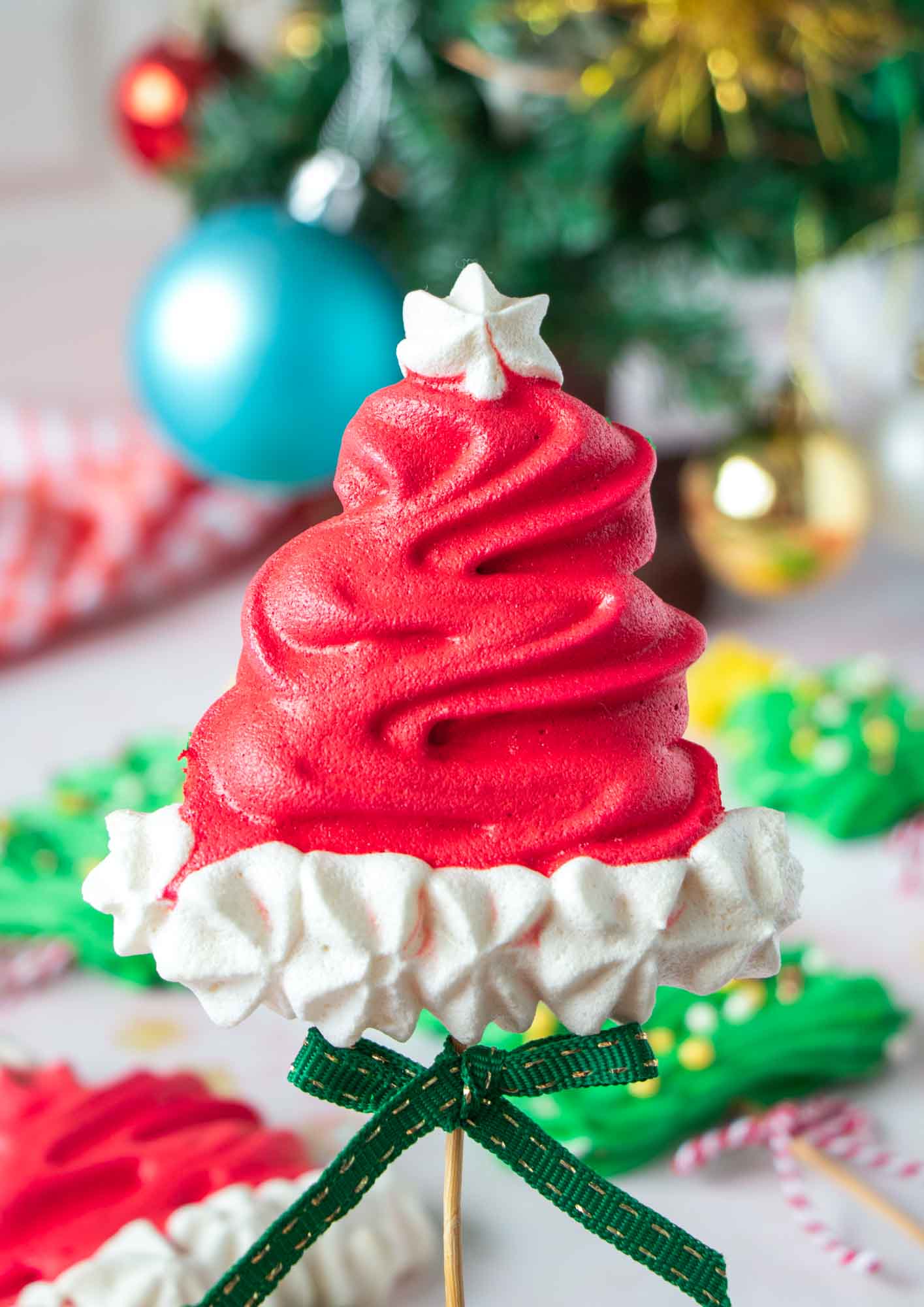 Christmas meringue pop shaped like a santa hat