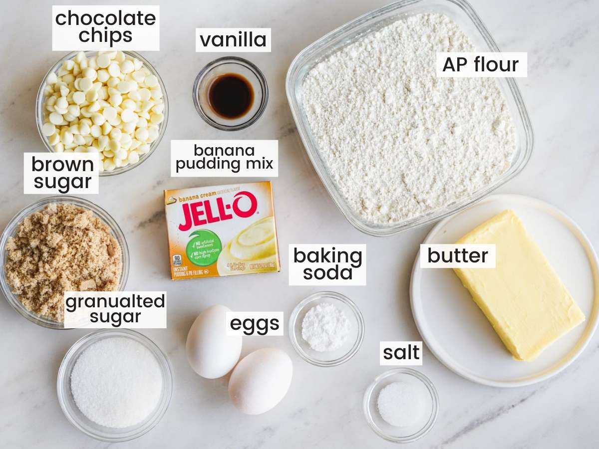 Ingredients needed to make banana pudding cookies, all in separate bowls on the counter. 