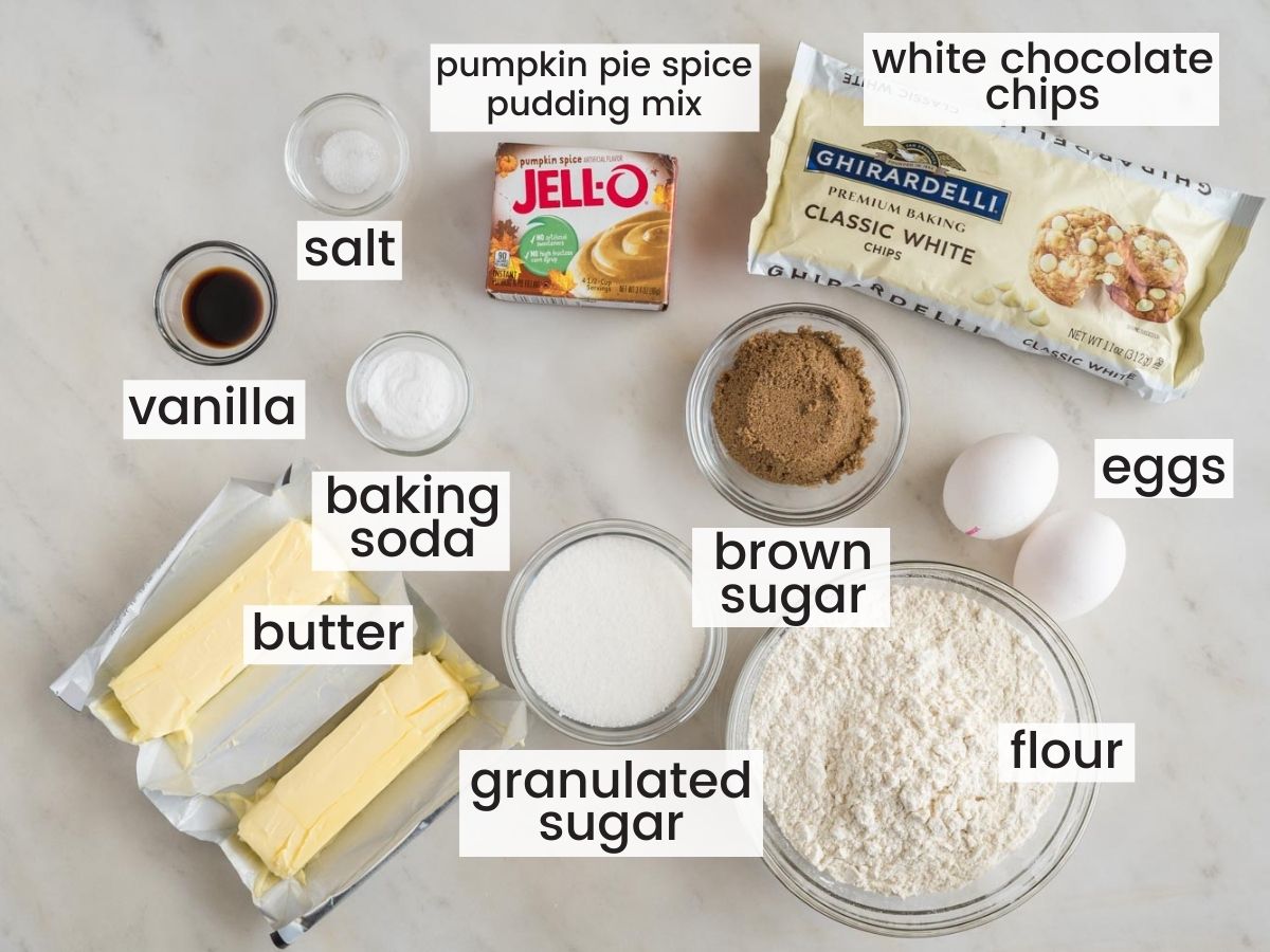 The ingredients needed to make pudding cookies with pumpkin spice, measured out and viewed from above