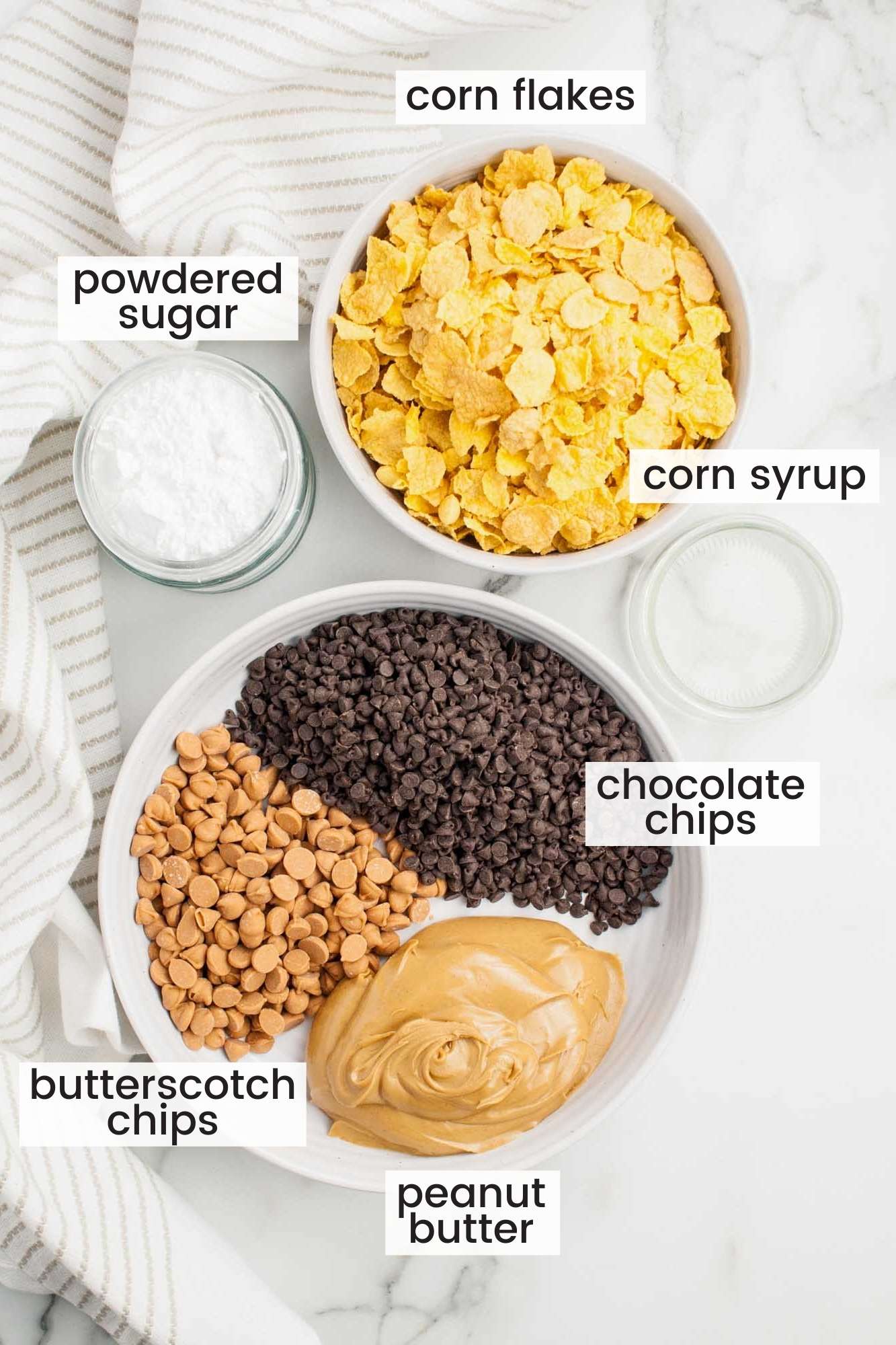 The ingredients for making no bake scotcheroo truffles, viewed from above, measured into small bowls. 