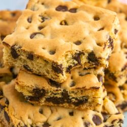 Close up shot showing a bite shot of cookie bars with chocolate chips