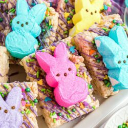 Easter themed rice krispie treats decorated with bunny peeps