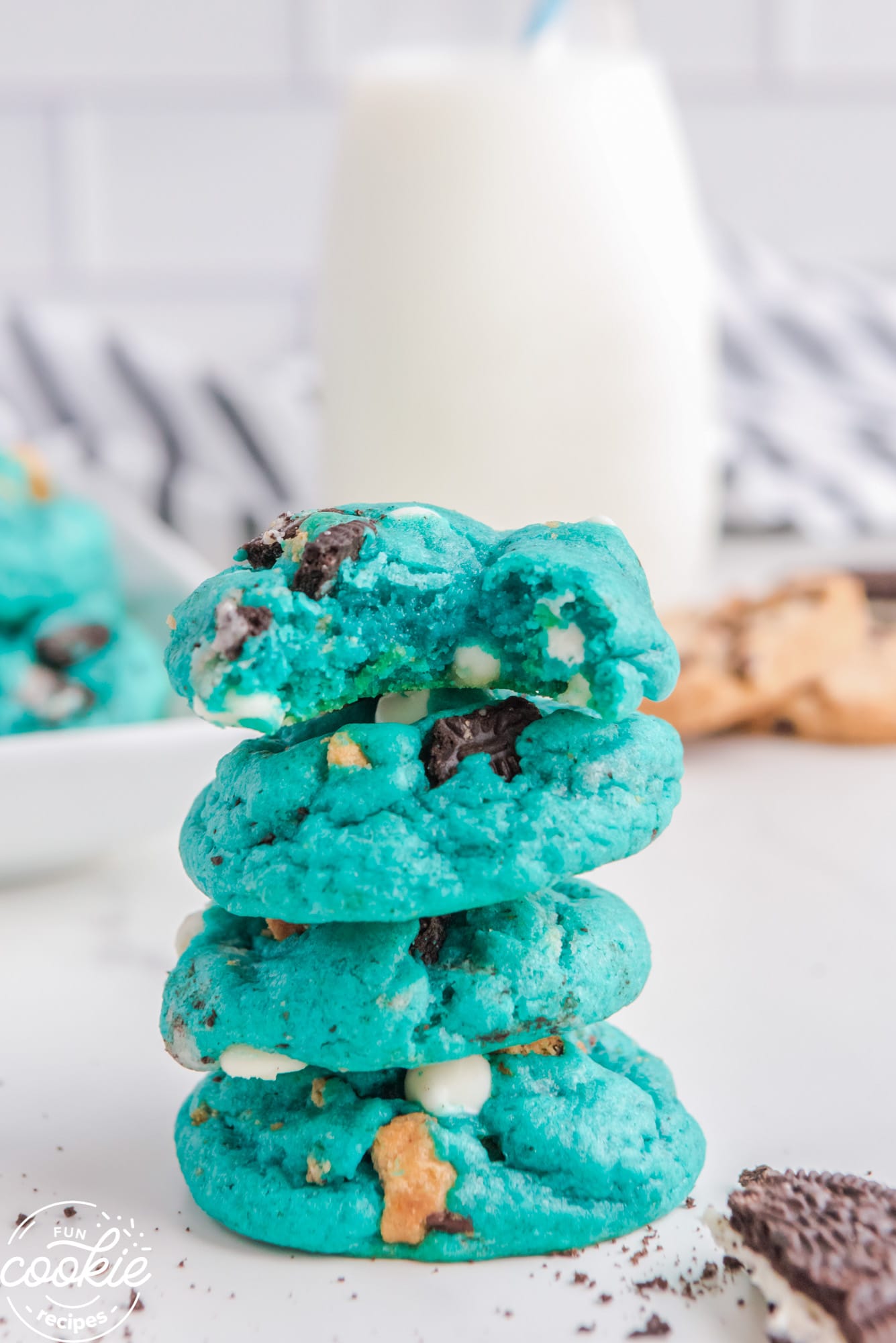 a stack of blue cookie monster cookies