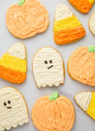 Overhead shot of the cutest halloween sugar cookies decorated with buttercream frosting