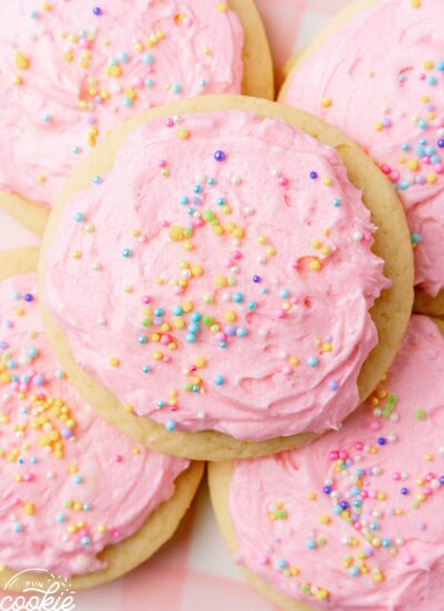 a pile of pink frosted sugar cookies.