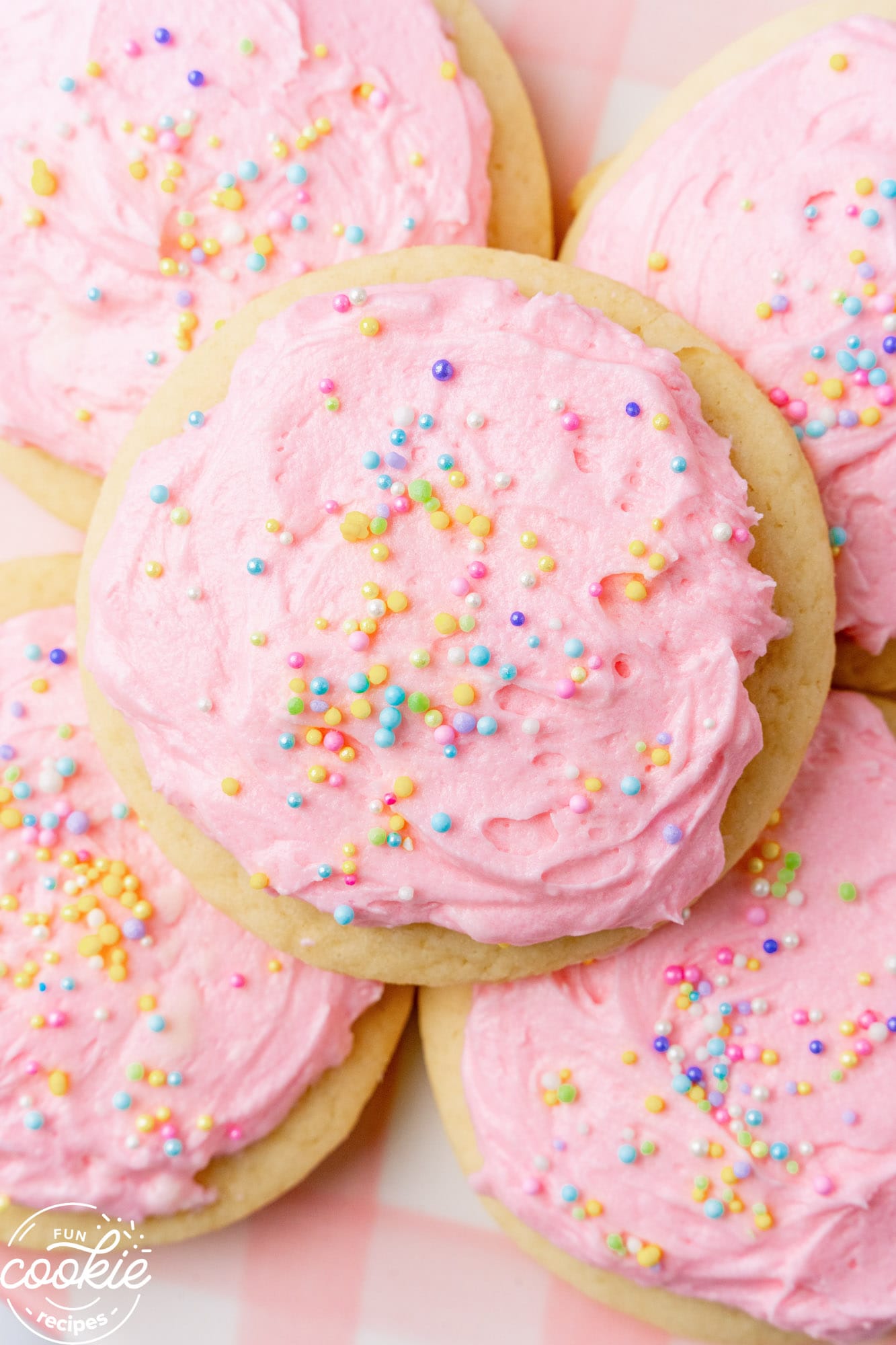 a pile of pink frosted sugar cookies.