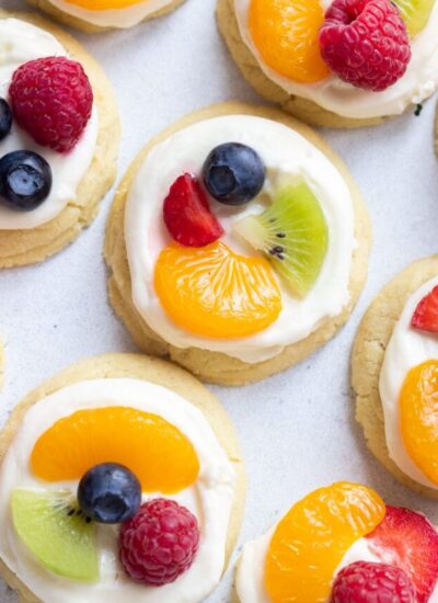 Overhead shot of sugar cooked with cream cheese frosting and fresh fruit