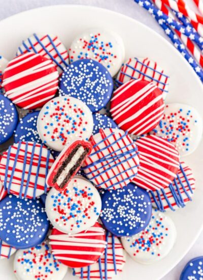 Overhead shot of patriotic Oreos on a white plate