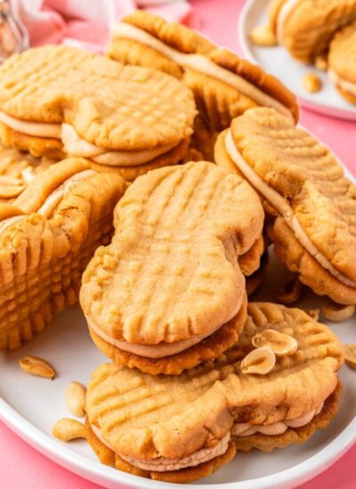 homemade peanut butter sandwich cookies on a plate.