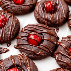 chocolate cookies with maraschino cherries, drizzled with chocolate.