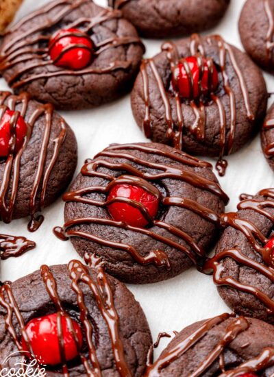 chocolate cookies with maraschino cherries, drizzled with chocolate.