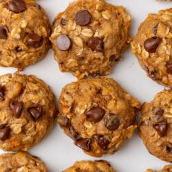 sweet potato cookies with chocolate chips and oats, lined up .